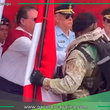 Gambini sorprendido en acto militar