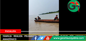 Familia realiza peligroso transbordo en pleno río Ucayali amazónico